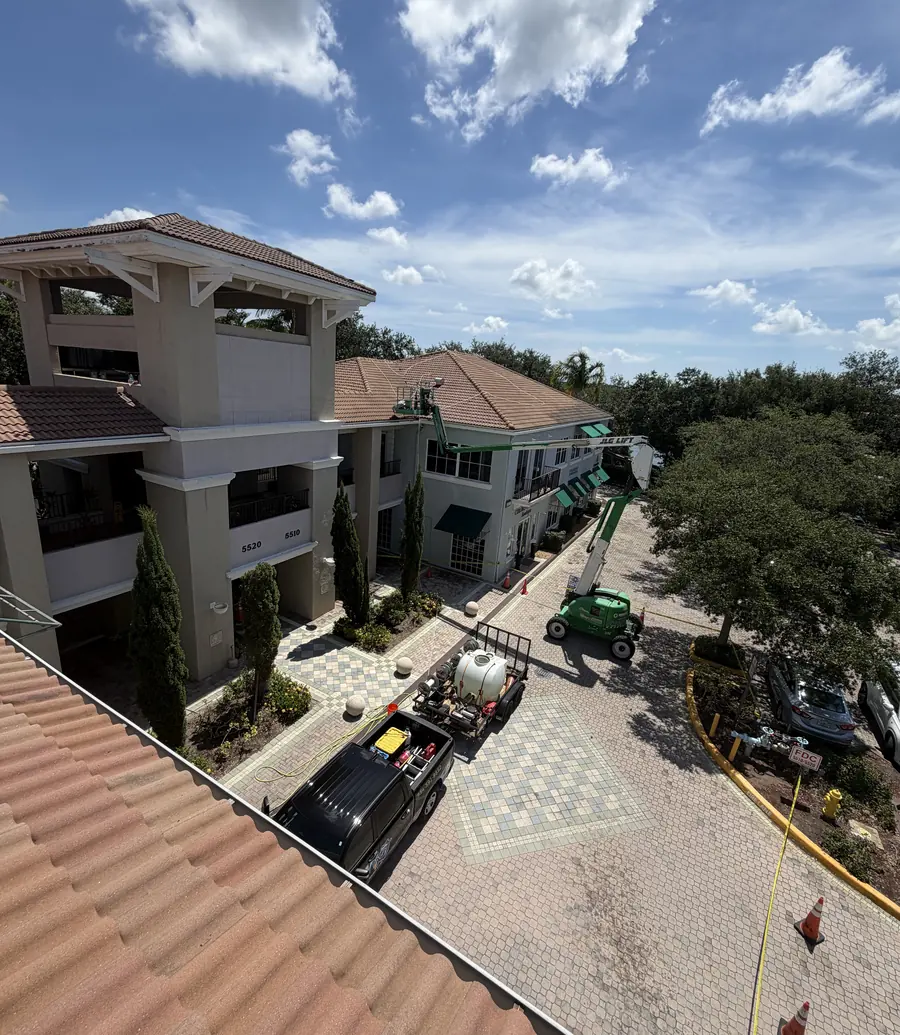Just Another Wash truck, equipment and lift on a commercial office plaza job in South Florida