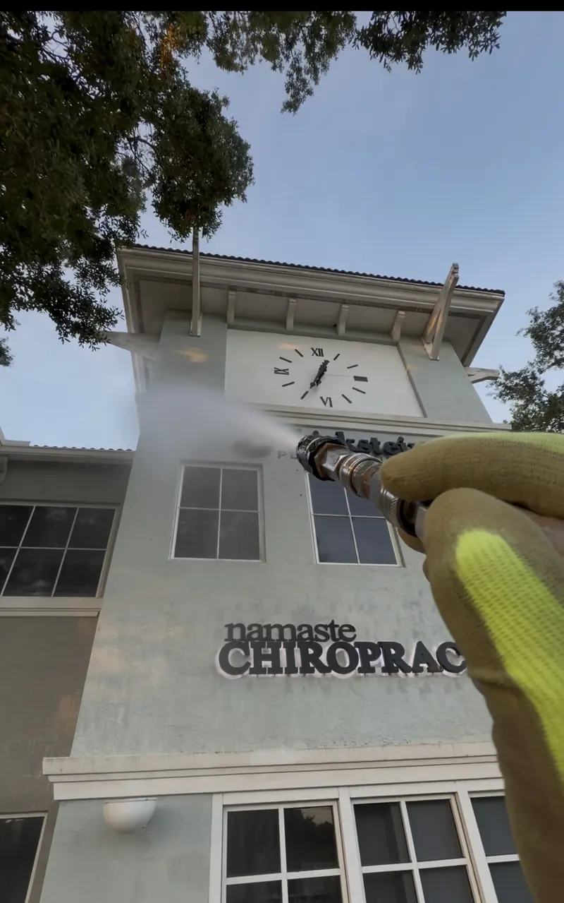 Just Another Wash soft washing a commercial office building